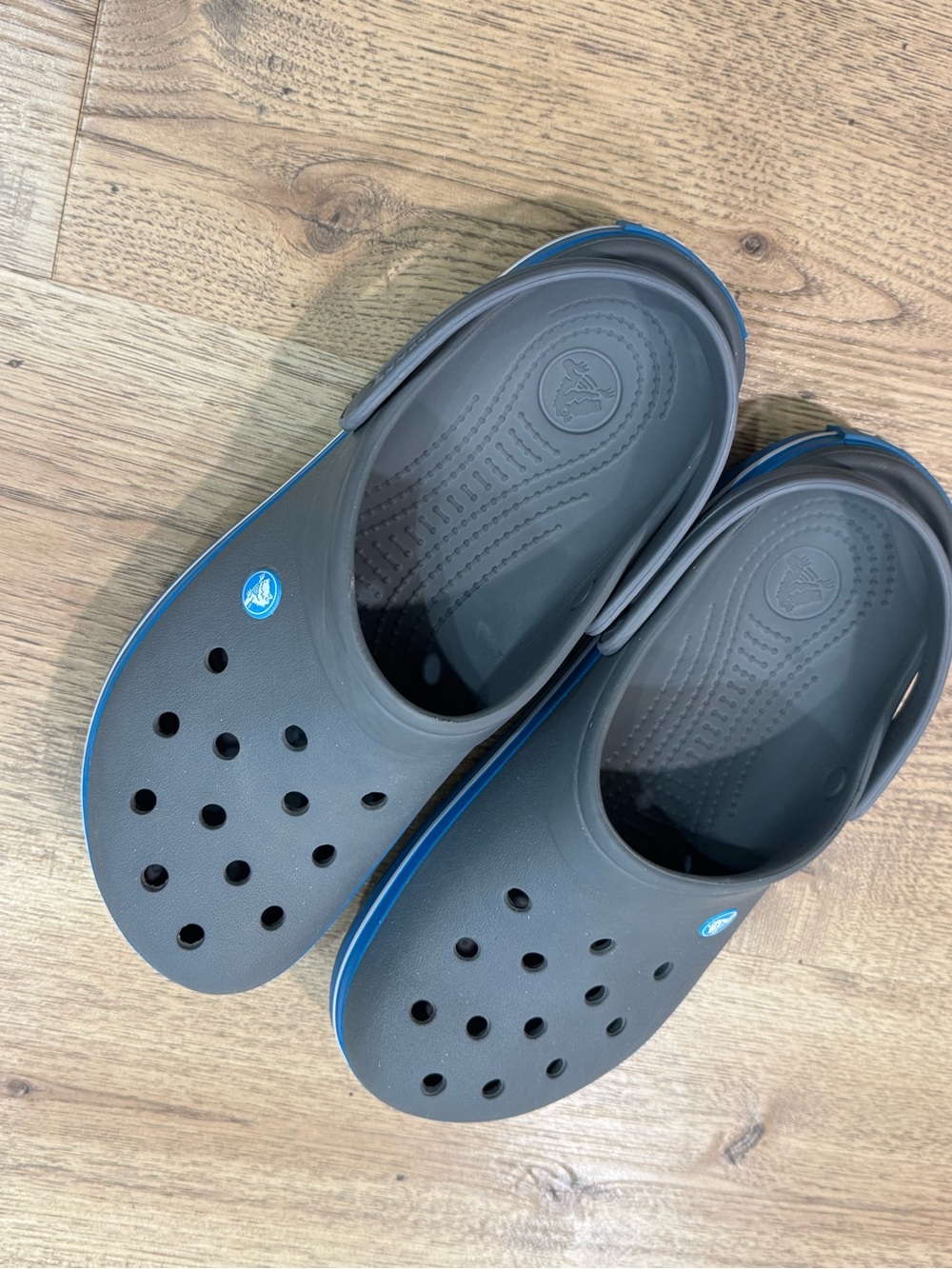 CROCS Men’s Gray Slip-On Clogs with Blue Trim